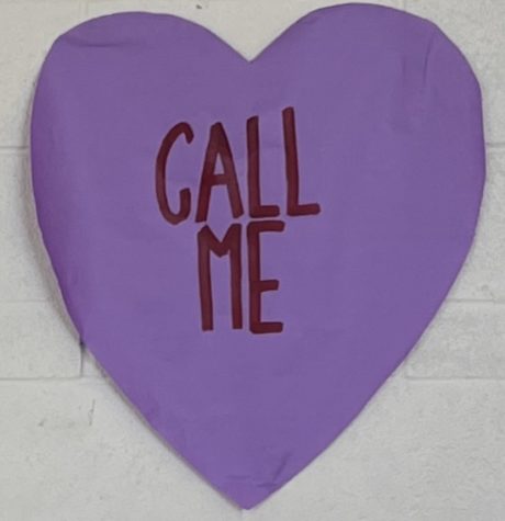 Purple Valentines Day heart with Call Me written on it.