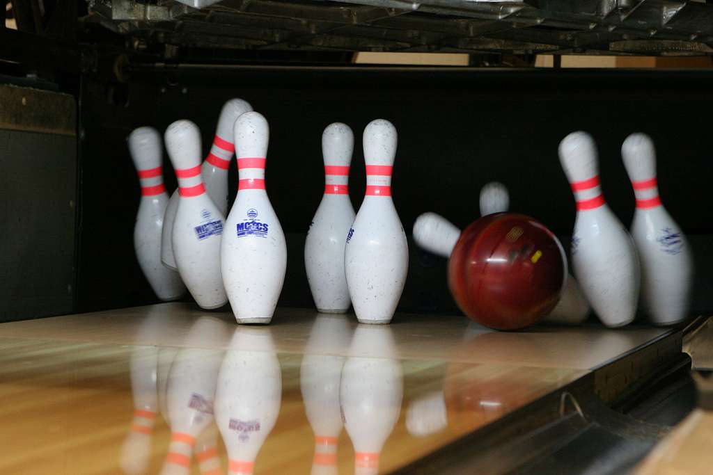 Pins being knocked over by a bowling ball. 
The appearance of U.S. Department of Defense (DoD) visual information does not imply or constitute DoD endorsement. 
