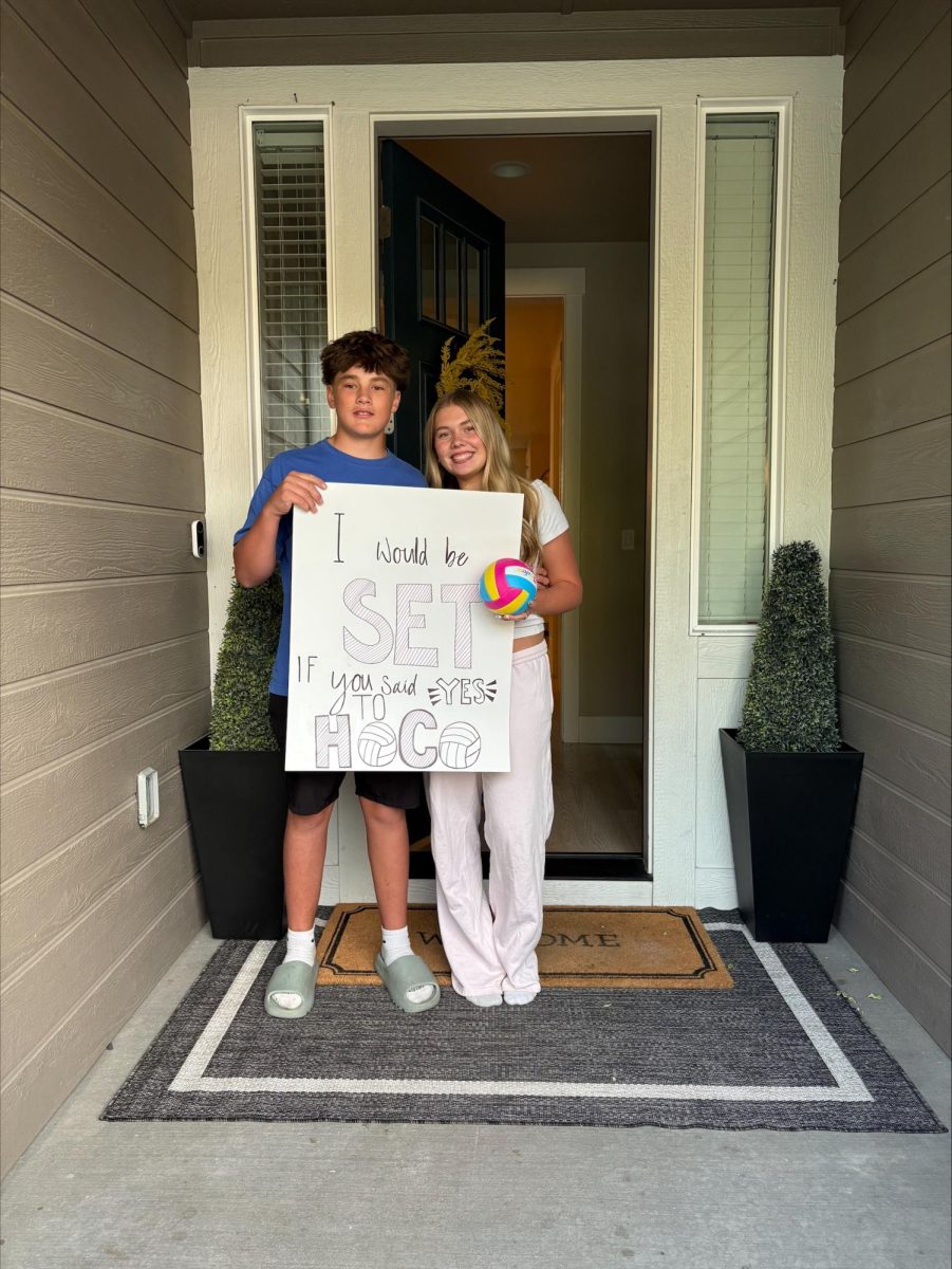 Sophomore Peyton Briggs getting asked to homecoming taken by Lindsay Briggs