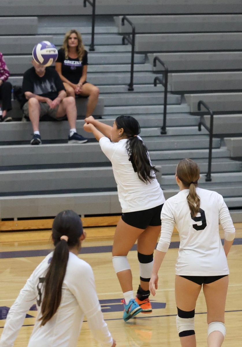 Isabella Moses, number 17 bumps the ball.