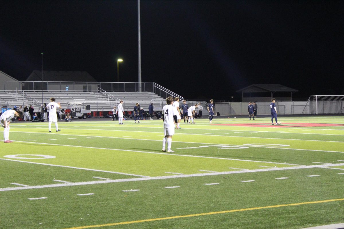 Trey Fullmer (No. 4) playing in the district championship. 
