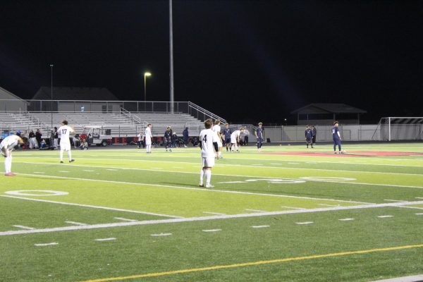 Trey Fullmer (No. 4) playing in the district championship.