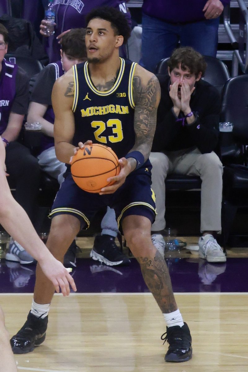 Michigan #23 Yaxel Lendeborg With the Ball in His Hands.
"20260211 Yaxel Lendeborg 09" by TonyTheTiger is marked with CC0 1.0.