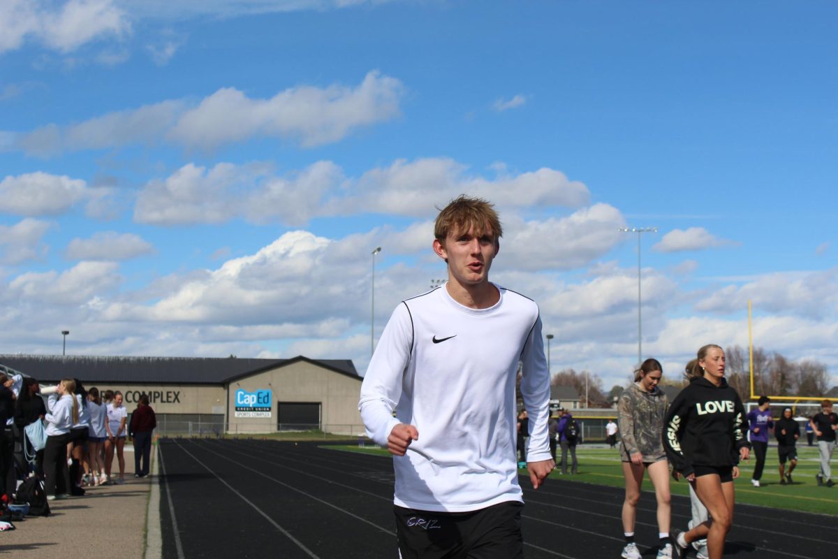 Hyrum Tuft runs on the Rocky track on Mar. 10, 2026. Photo by Kaylee Allen.