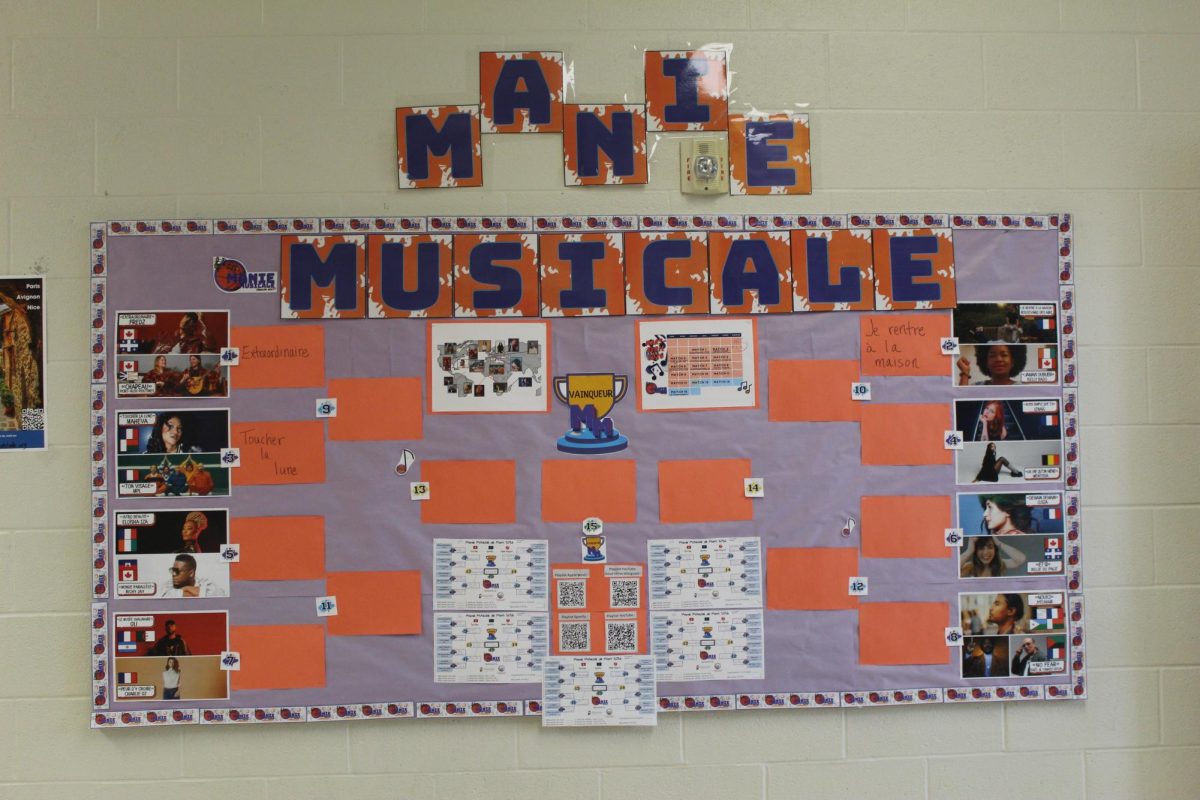 French clubs' Manie Musicale in front of French Classroom