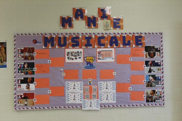 French clubs' Manie Musicale in front of French Classroom