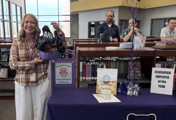 Photo taken from Rocky's Instagram featuring Alycia Osterhout and her award basket after earning employee of the year (certified) Shown in background are Quentin DeWitt, Paul Meunier, and Casey Higginbotham